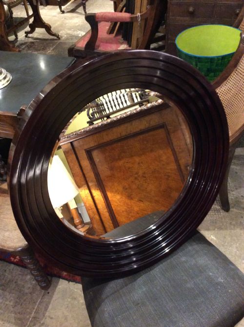 An Art Deco Lacquered Circular Mirror