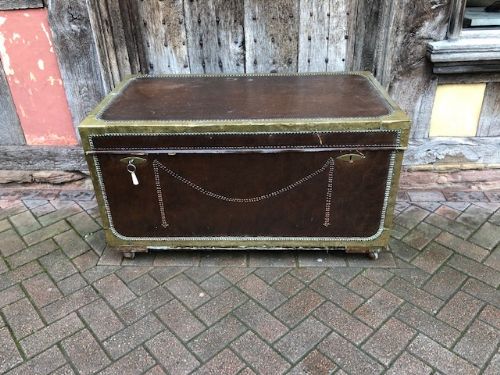 A 19thc Rexine Covered & Brass Bound Camphor Wood Trunk