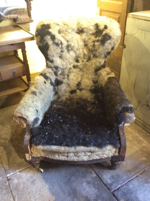 

A 19thc  Rosewood Armchair for Upholstery, Attributed to Holland & Sons