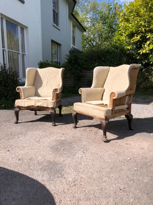 A Pair of 19th Mahogany & Beechwood Winged Armchairs