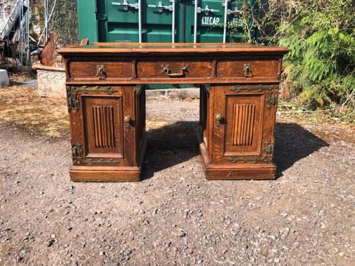 A 19th Century Gothic Revival Oak Three Part Pedestal Desk