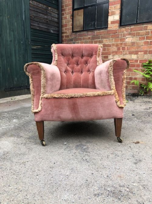 An Edwardian Howard & Sons Woodstock-style Tub Chair