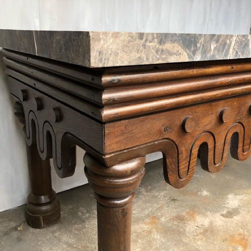 fig 2. A mid-19th century oak and marble side table in the Neo-Norman taste