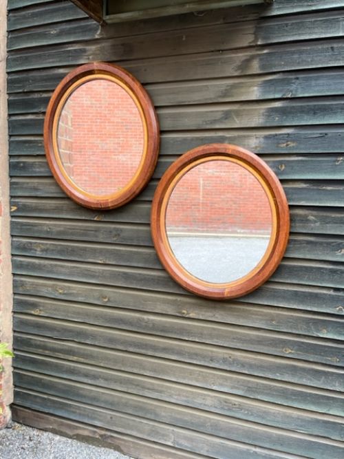 Pair of 19th Century Oval Oak Mirrors