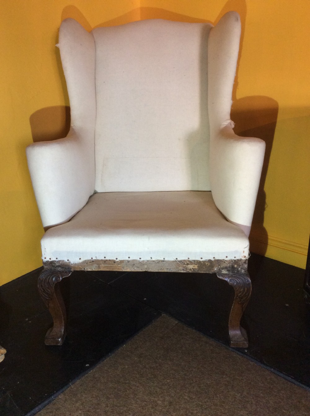 18th C English Walnut cab leg wing armchair.