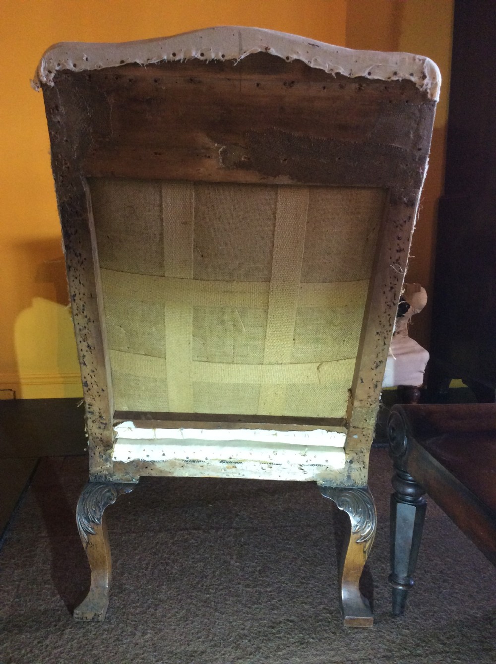 18th C English Walnut cab leg wing armchair. View IV