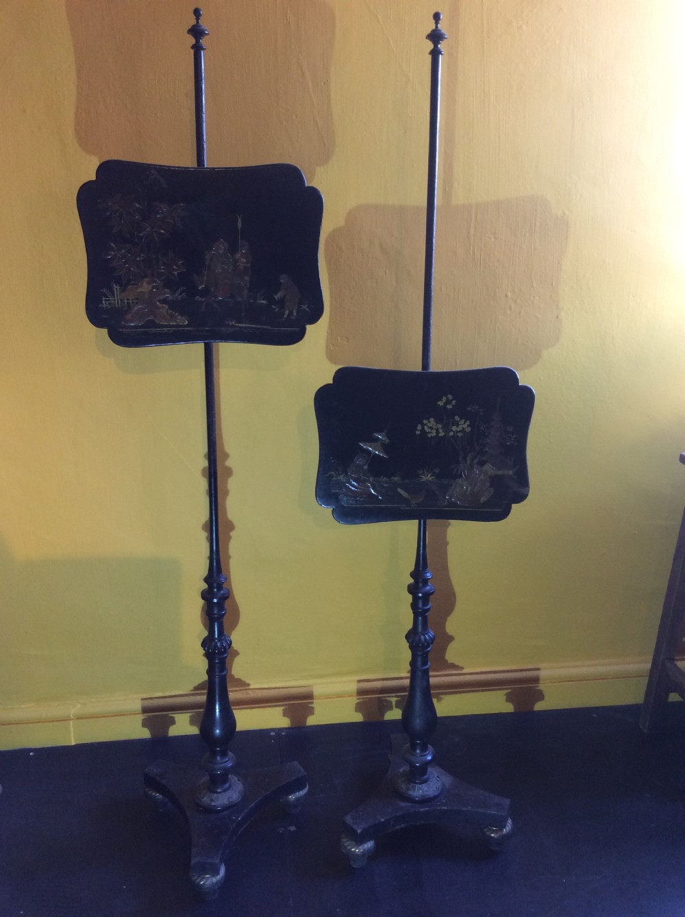 Pair of Regency chinoiserie pole stands. View II