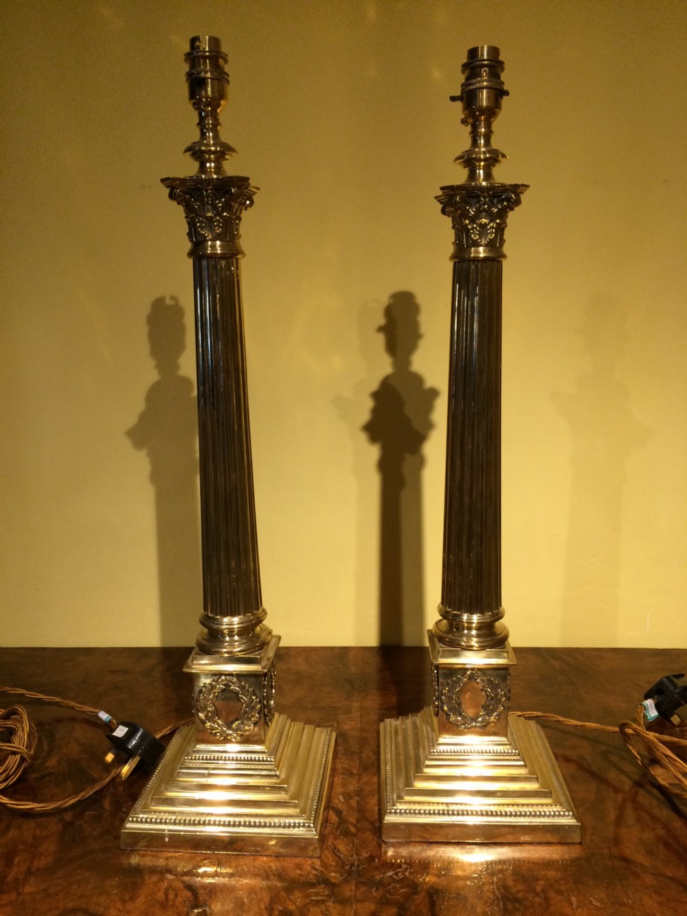 Early 20thC Pair of brass corythian columns lamp bases