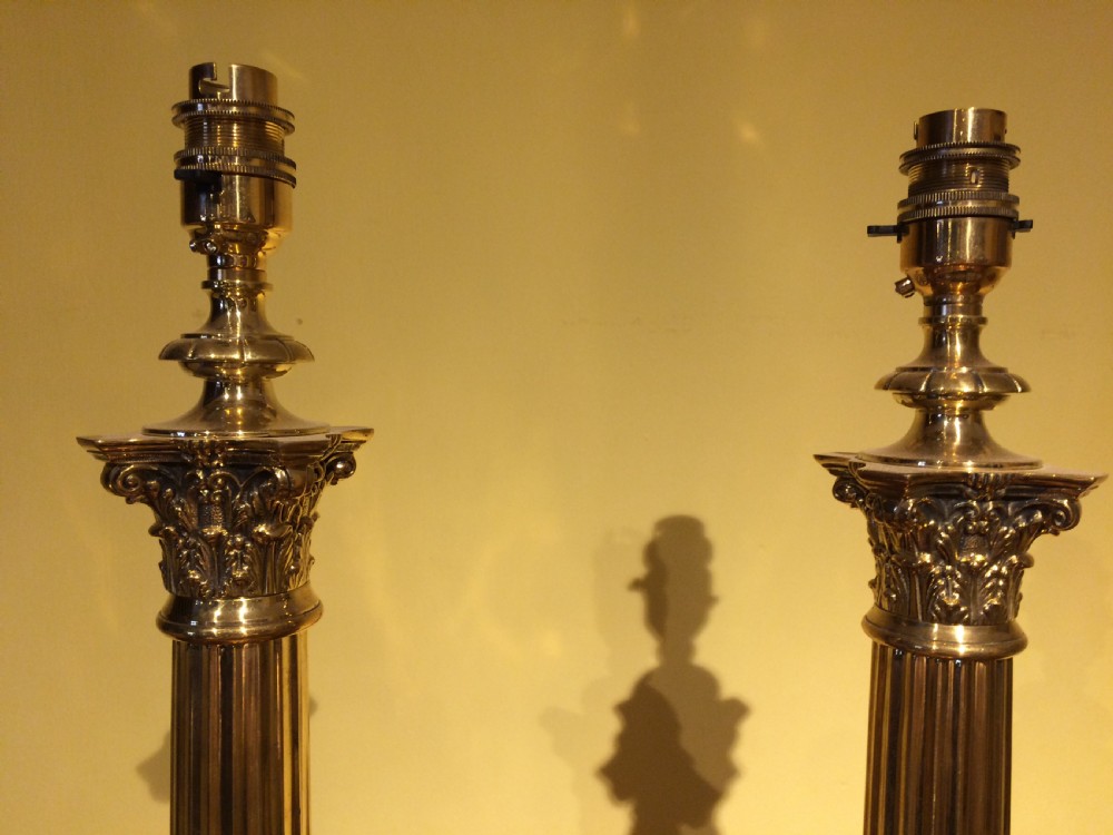 Early 20thC Pair of brass corythian columns lamp bases View III