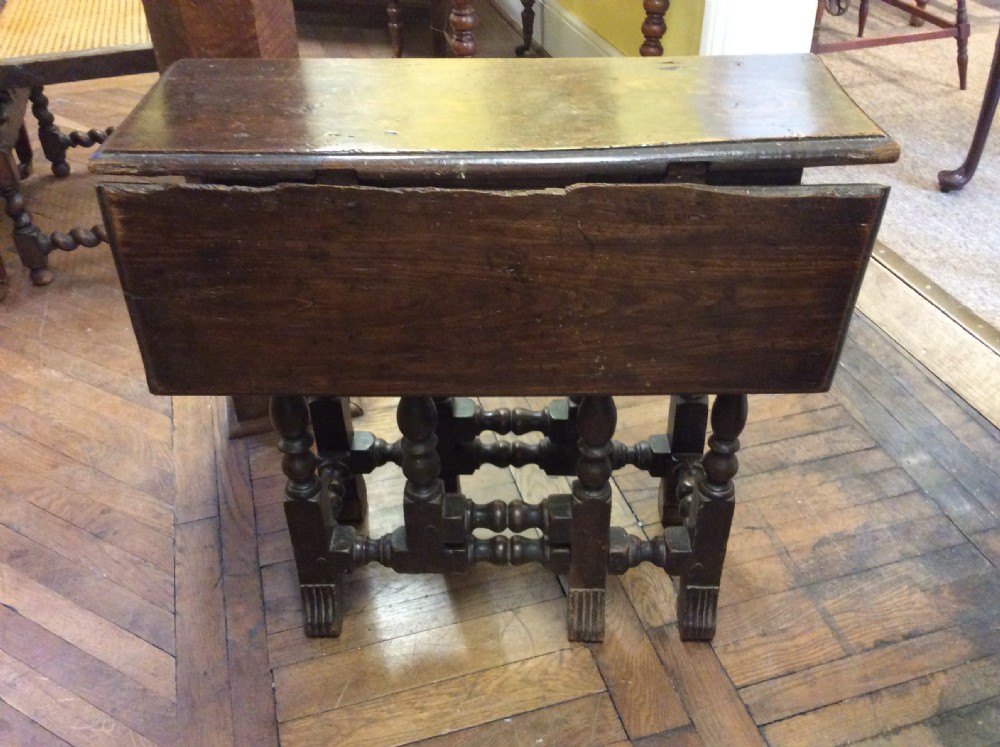 Late 17thC Elm gateleg table with broganza feet c. 1680 View V
