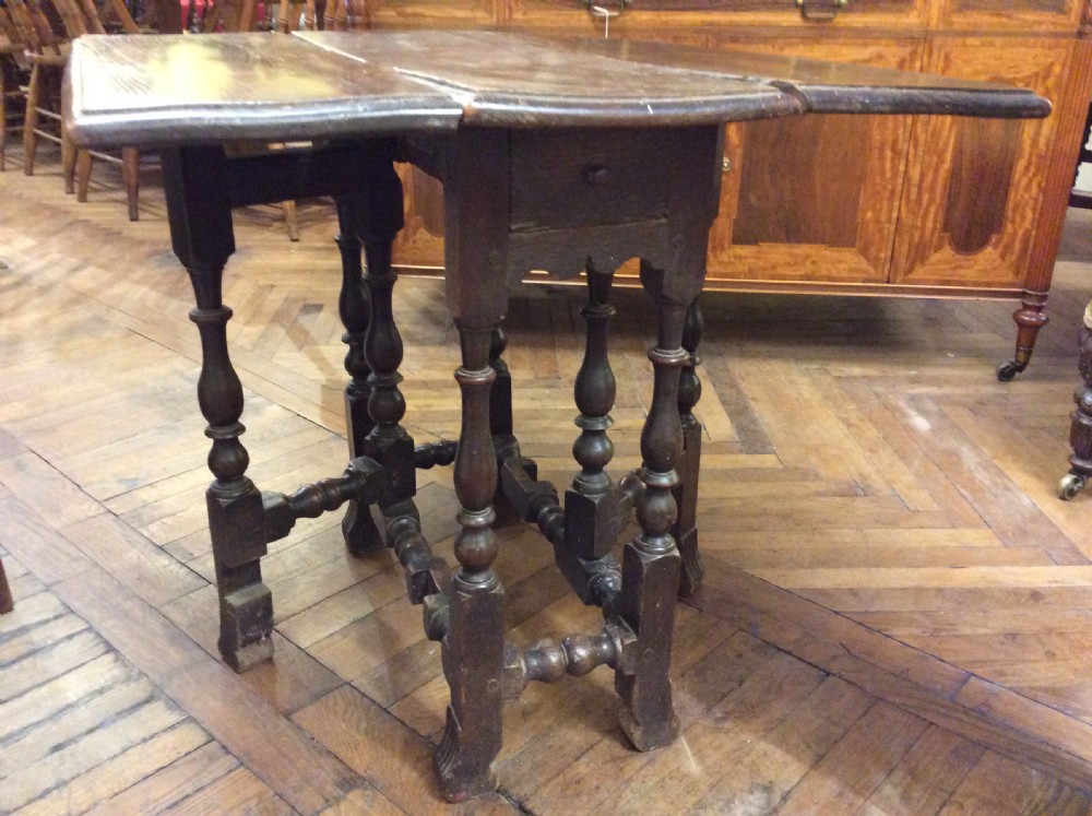 Late 17thC Elm gateleg table with broganza feet c. 1680 View IX