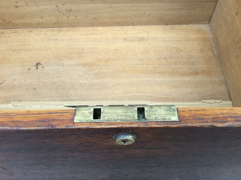 19thC Oak box with brass handles, posting slot. Fitted with a Bramah lock View V