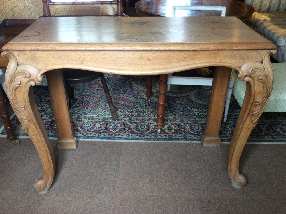 19thC Light oak console table on cabriole legs