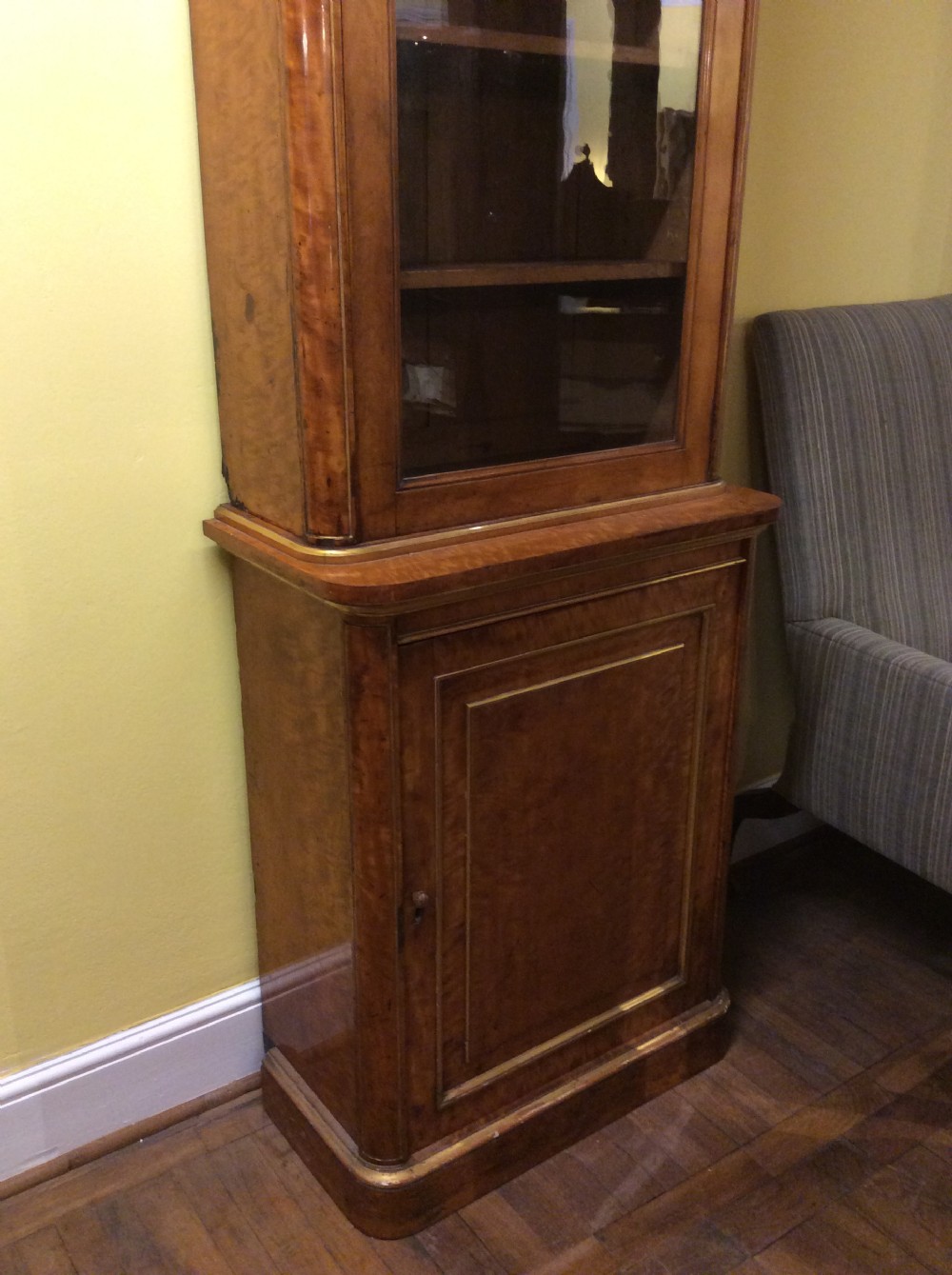 19thC Birchwood & parcel gilt narrow bookcase by Holland & Sons View II