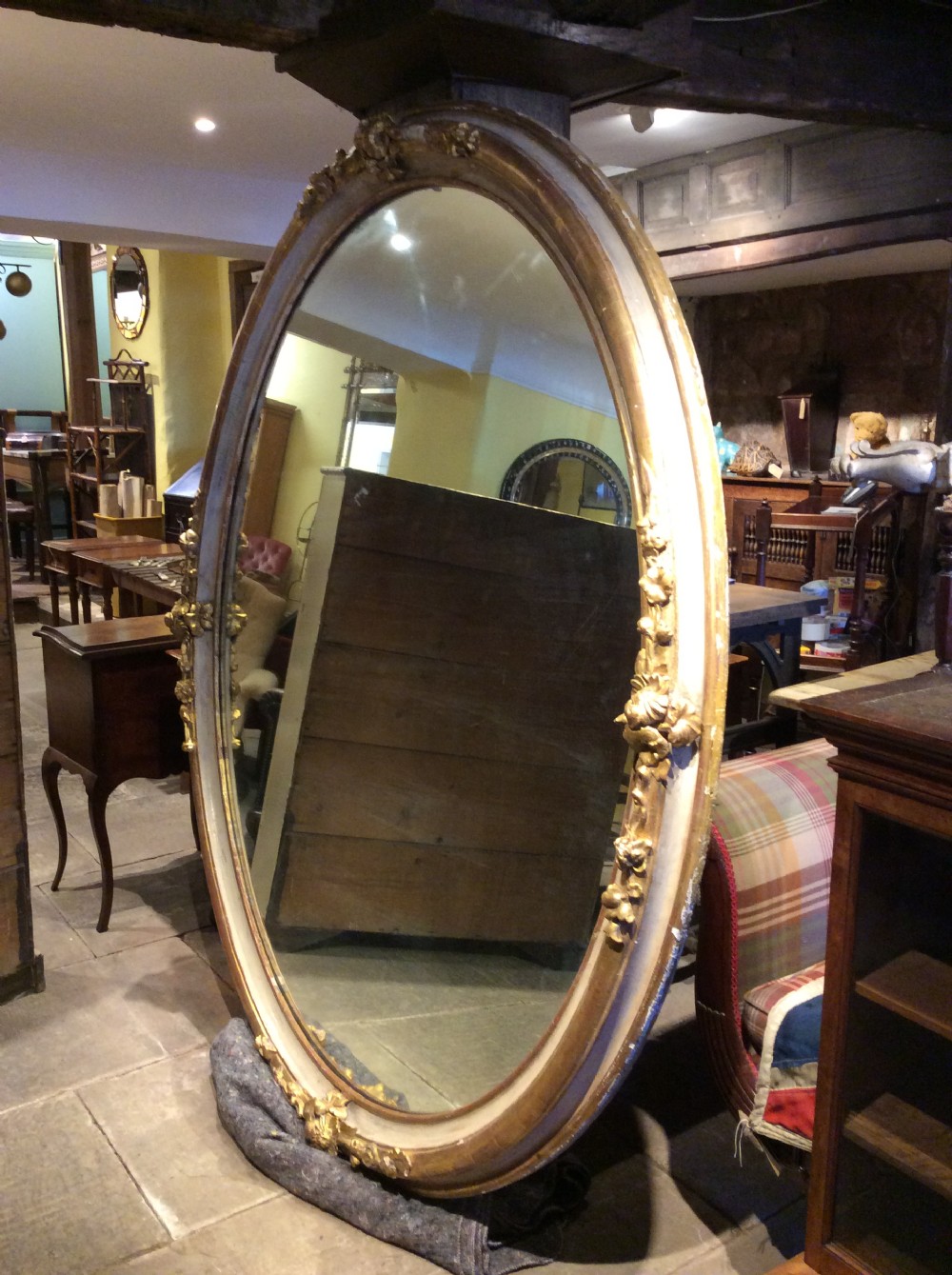 19thC very large oval mirror View II