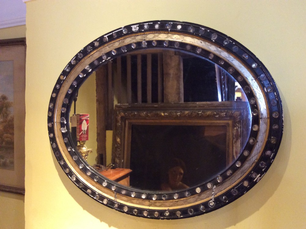 19thC Irish oval mirror