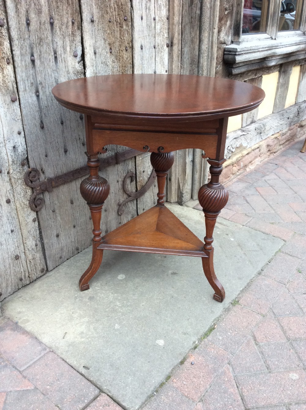 19thC Walnut lamp table stamped Howard & Sons View V