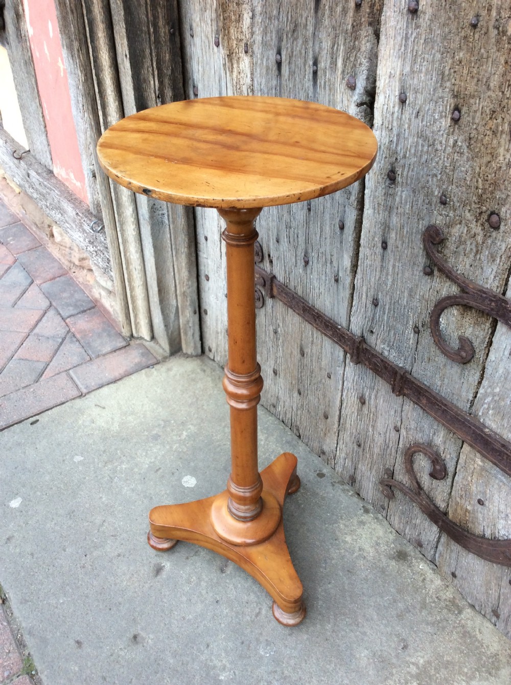 19thC Satin birch tripod table stamped Hindley & Sons 
