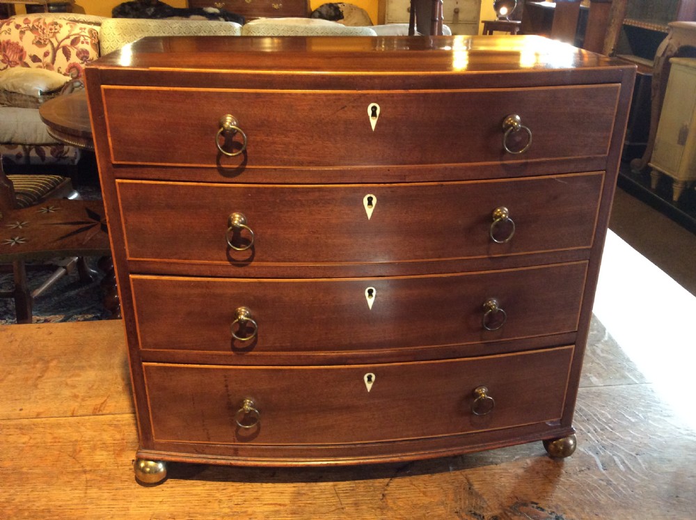 Regency Mahogany Bow front miniature chest of drawers View III