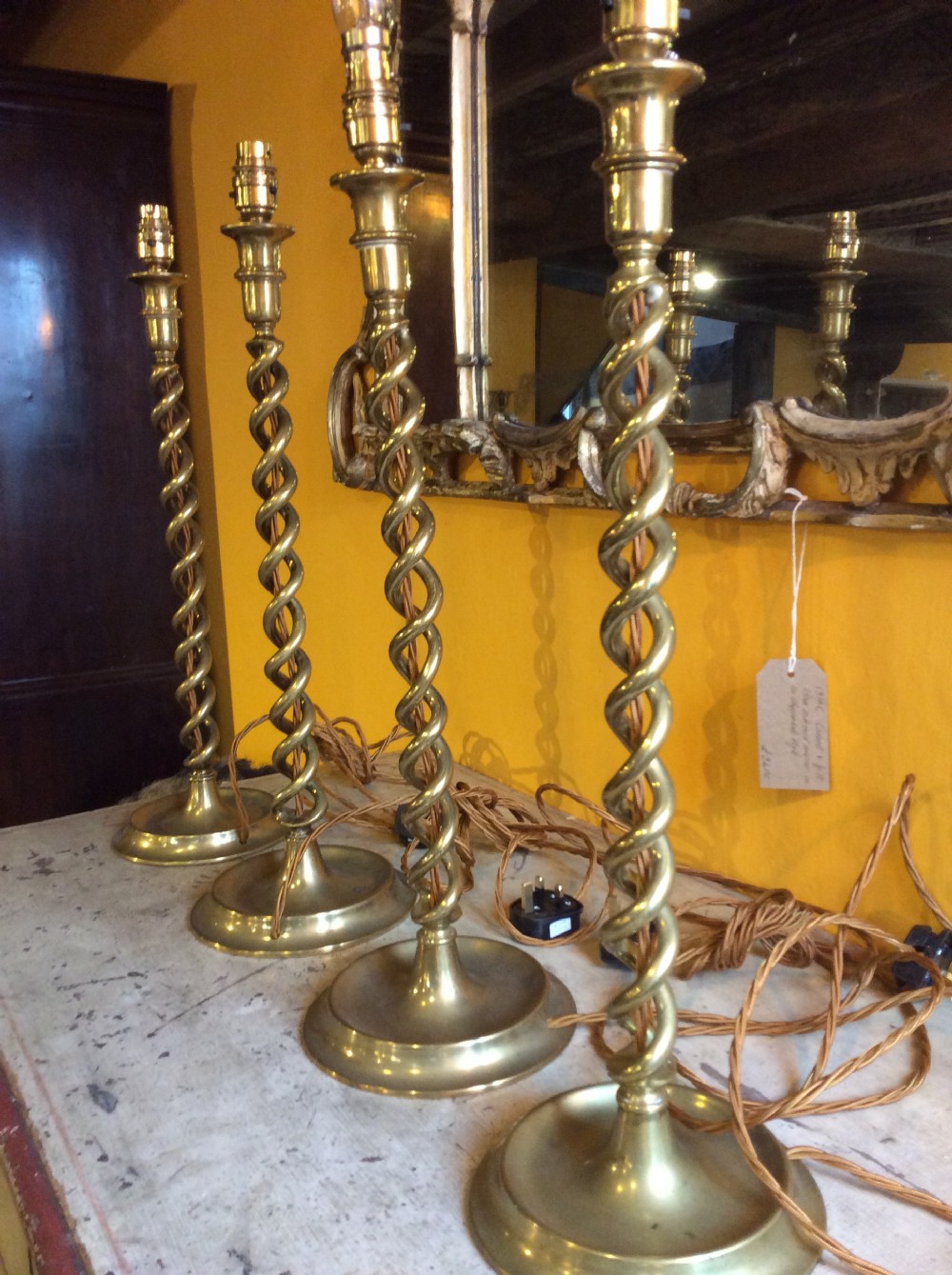 Set of 4  19thC brass sticks converted to electric lamps