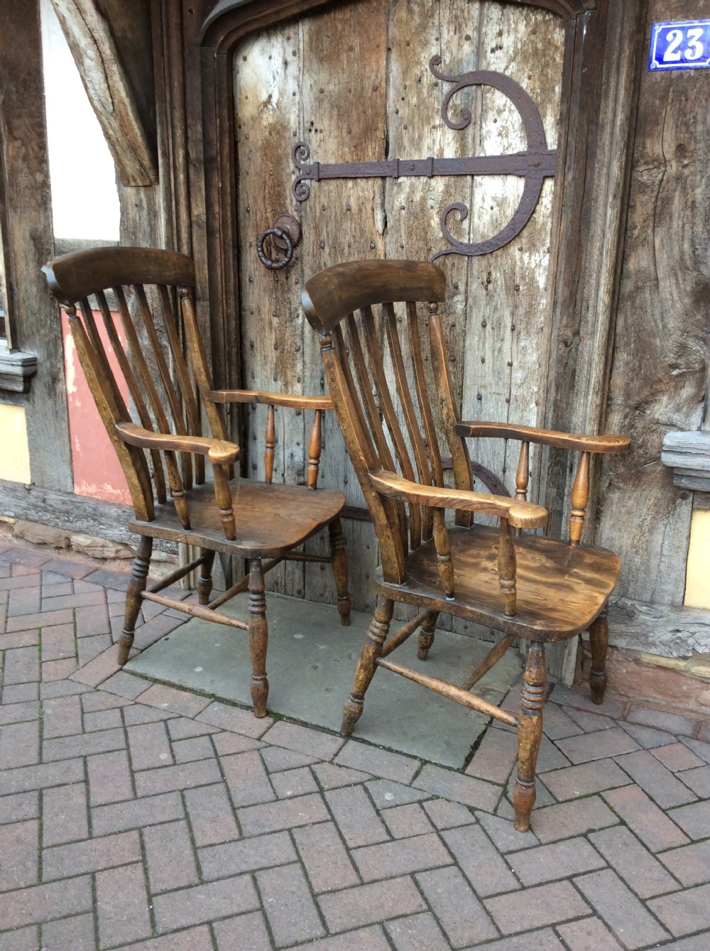 Pair of 19thC country elm armchairs View V