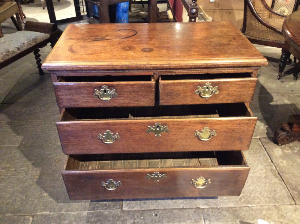 18thC small Oak chest of drawers on bracket feet View V
