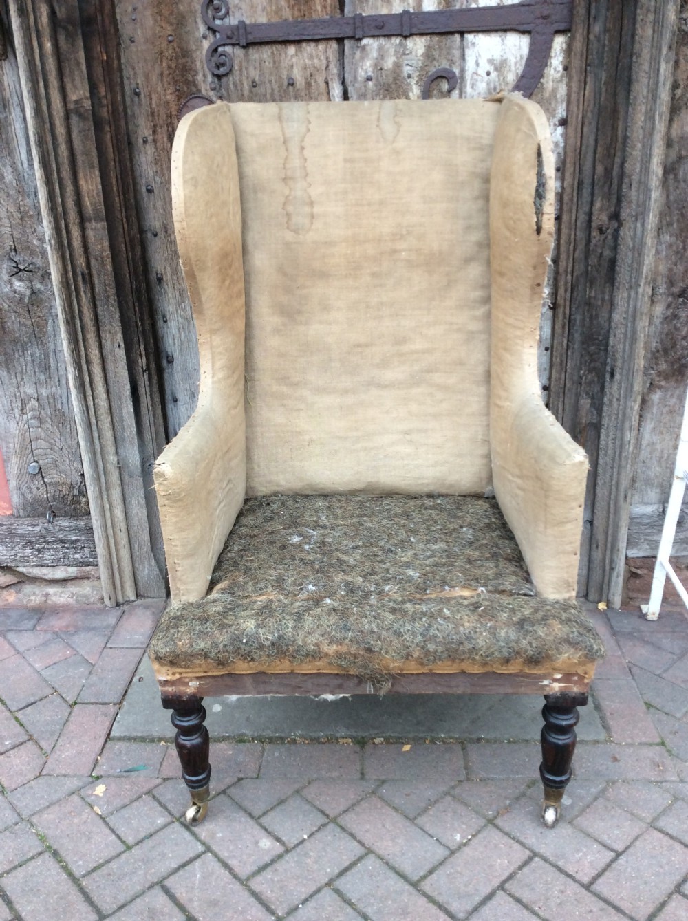 19thC Simulated Rosewood wing armchair