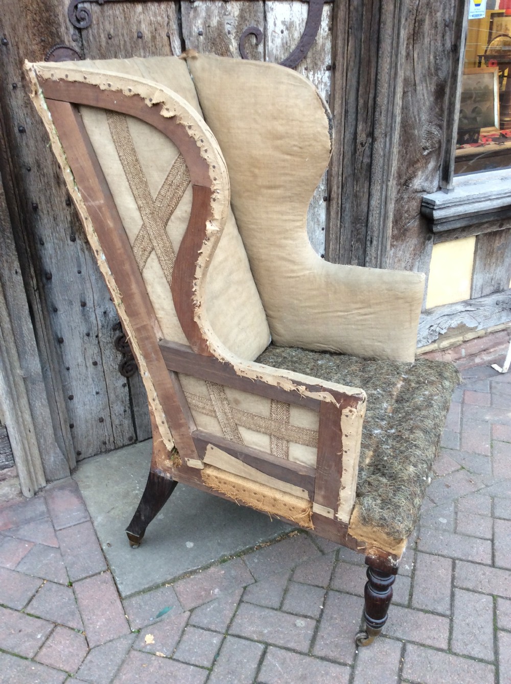 19thC Simulated Rosewood wing armchair View II