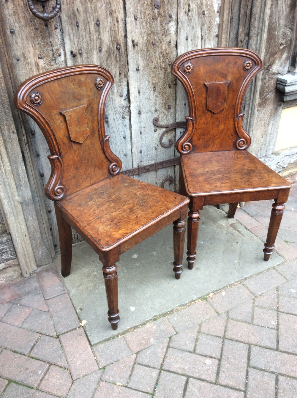 19thC Pair of pollard oak hall chairs View II