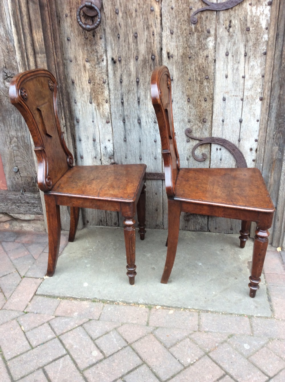 19thC Pair of pollard oak hall chairs View VIII