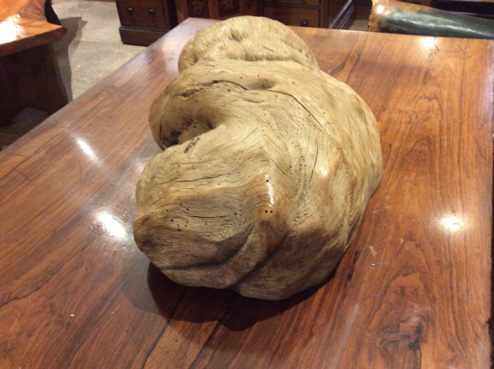 Folk art wood carving of a recumbent dog c.1890 View II