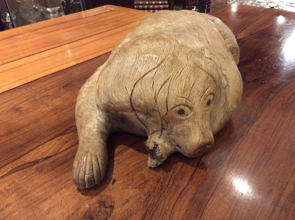 Folk art wood carving of a recumbent dog c.1890 View III