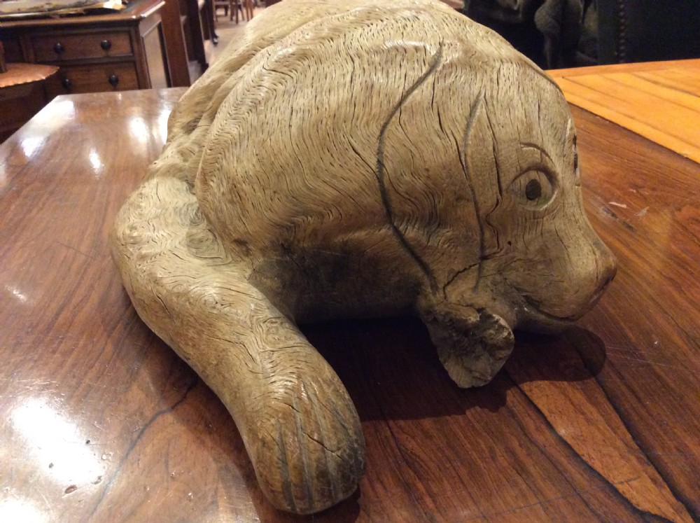 Folk art wood carving of a recumbent dog c.1890 View V