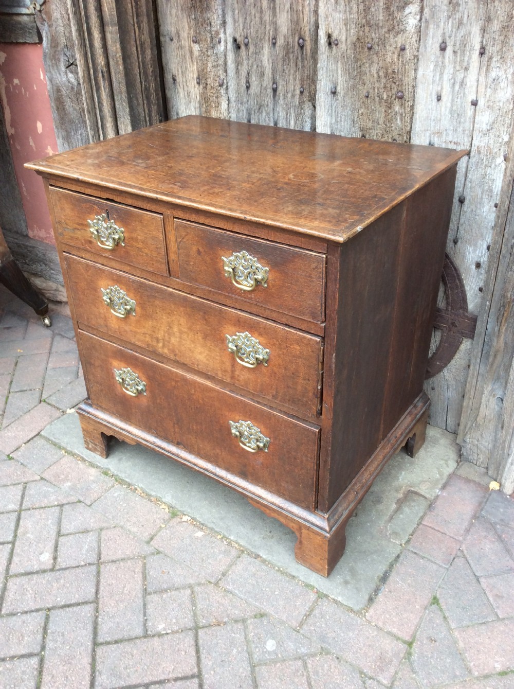 18thC Oak small chest of 4 drawers on bracket feet View III