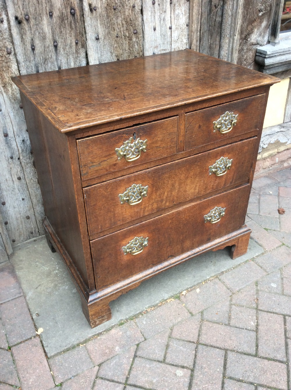 18thC Oak small chest of 4 drawers on bracket feet View IV