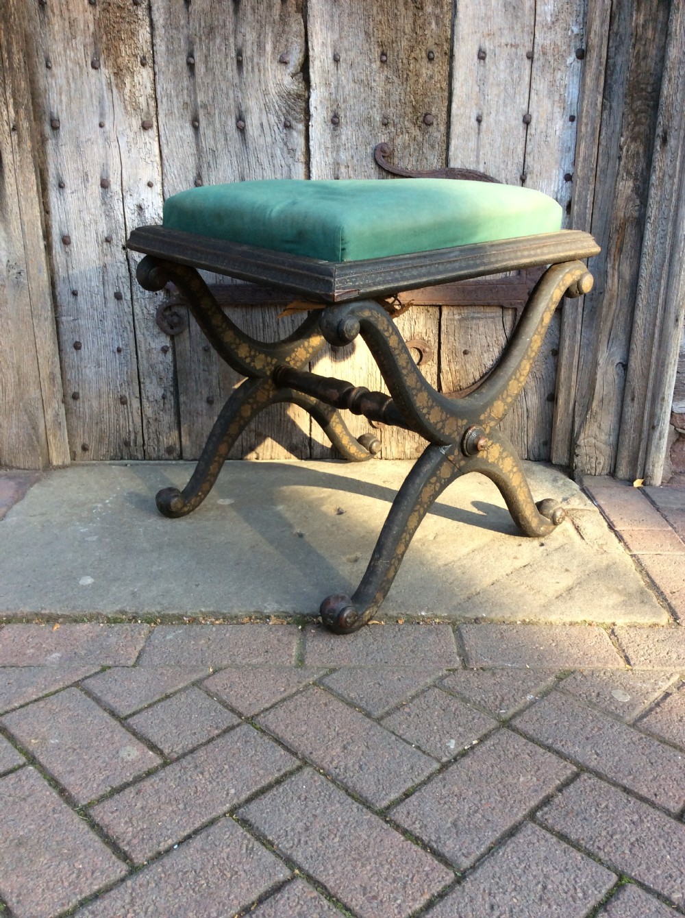 Early 19thC X framed ebonised and decorated stool View II