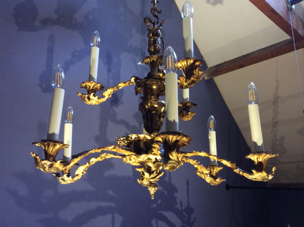 A 9 branch gilt brass chandelier View III