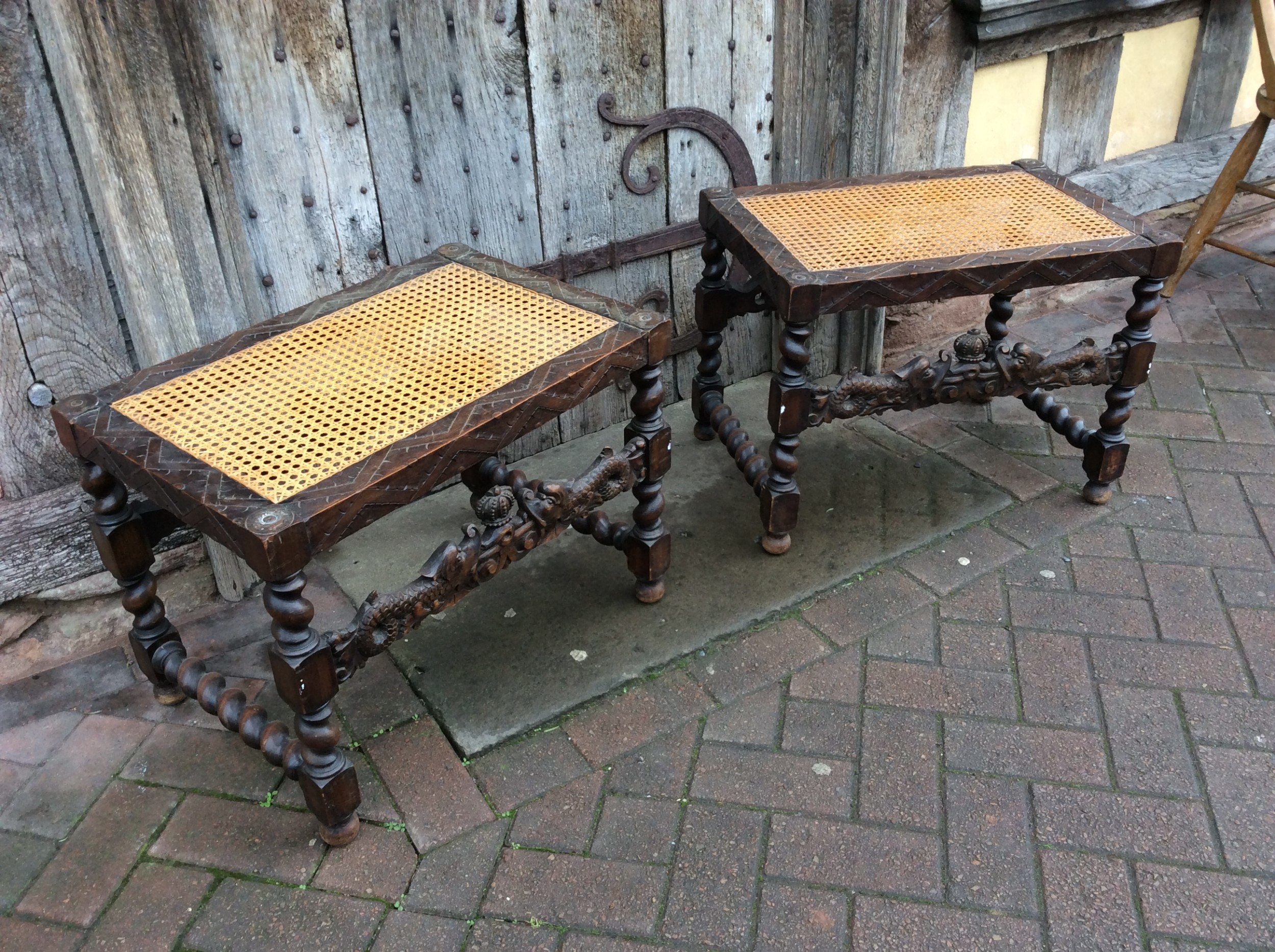 Pair of caned stained beech stools