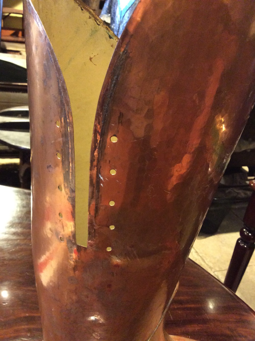 A large quirky copper and brass boot View VIII