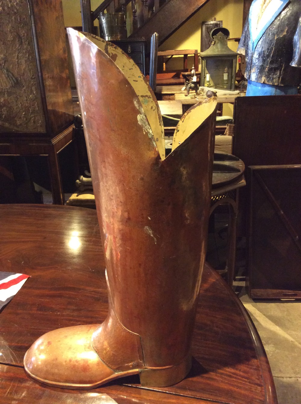 A large quirky copper and brass boot View V