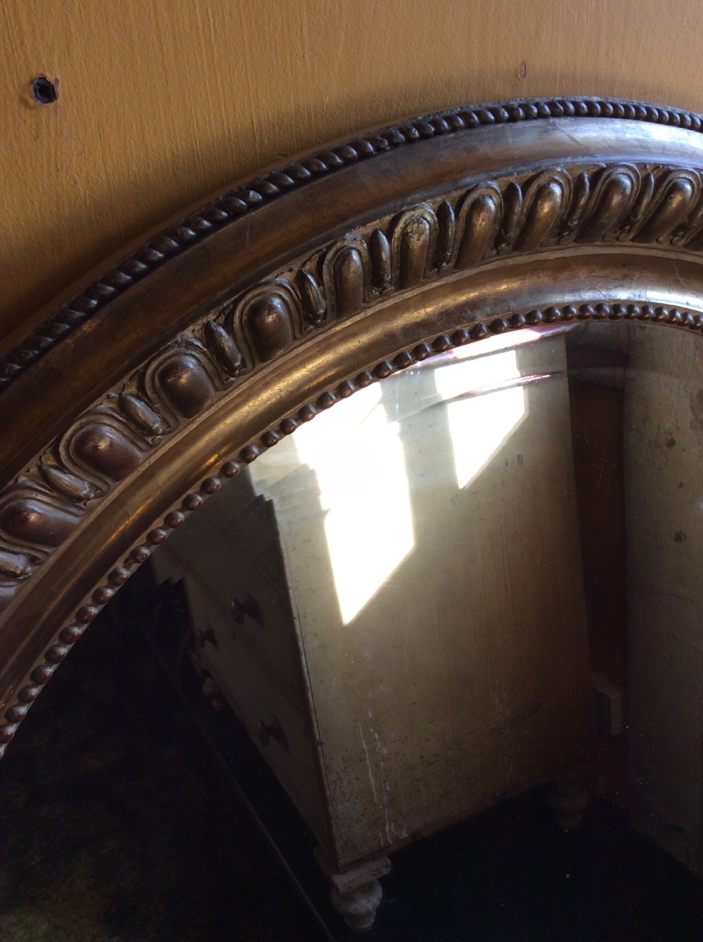 19thC oval gilded mirror View II