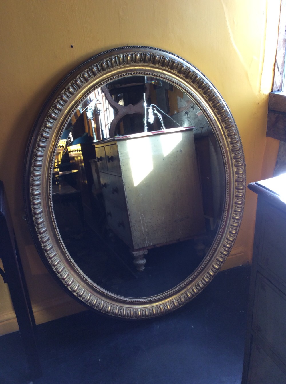 19thC oval gilded mirror View III