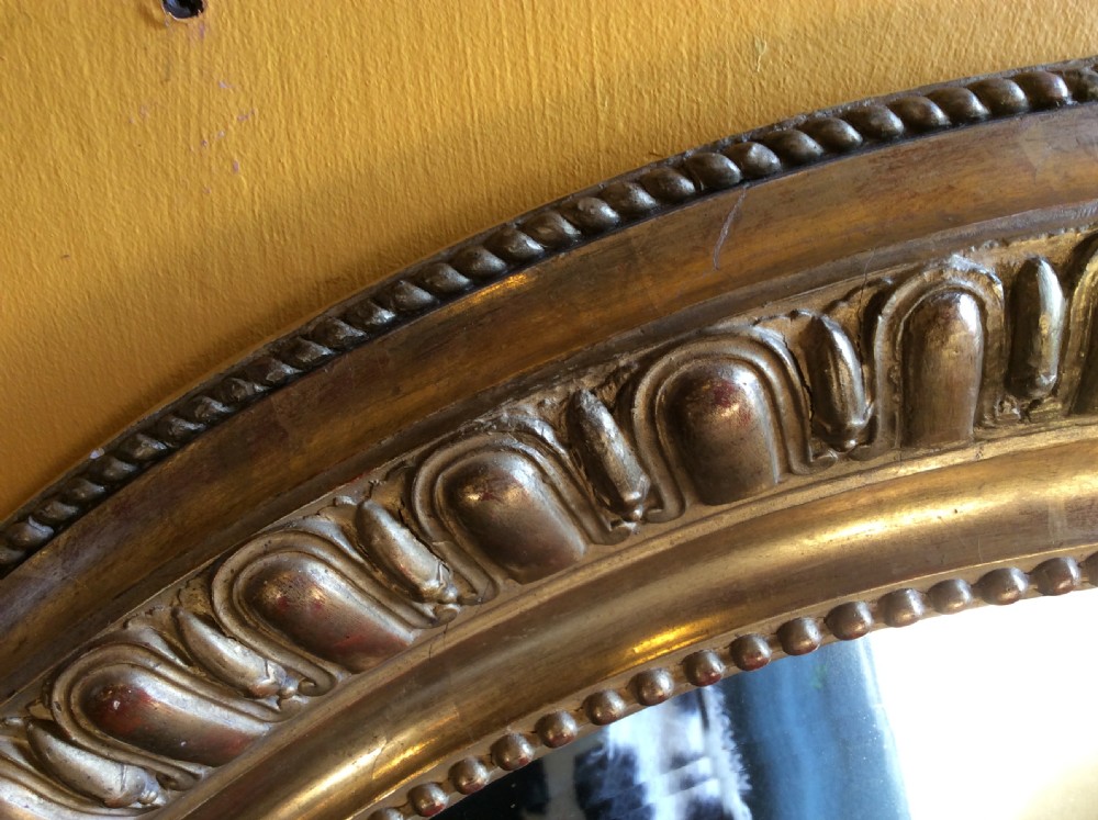 19thC oval gilded mirror View VI