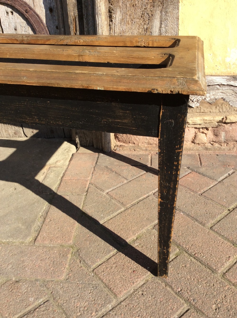 Pair of ebonised and beech luggage racks View III