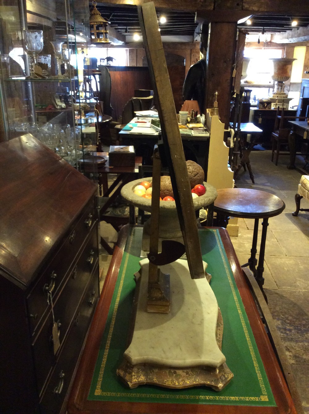 Decorated tilting table mirror on marble plinth View VII