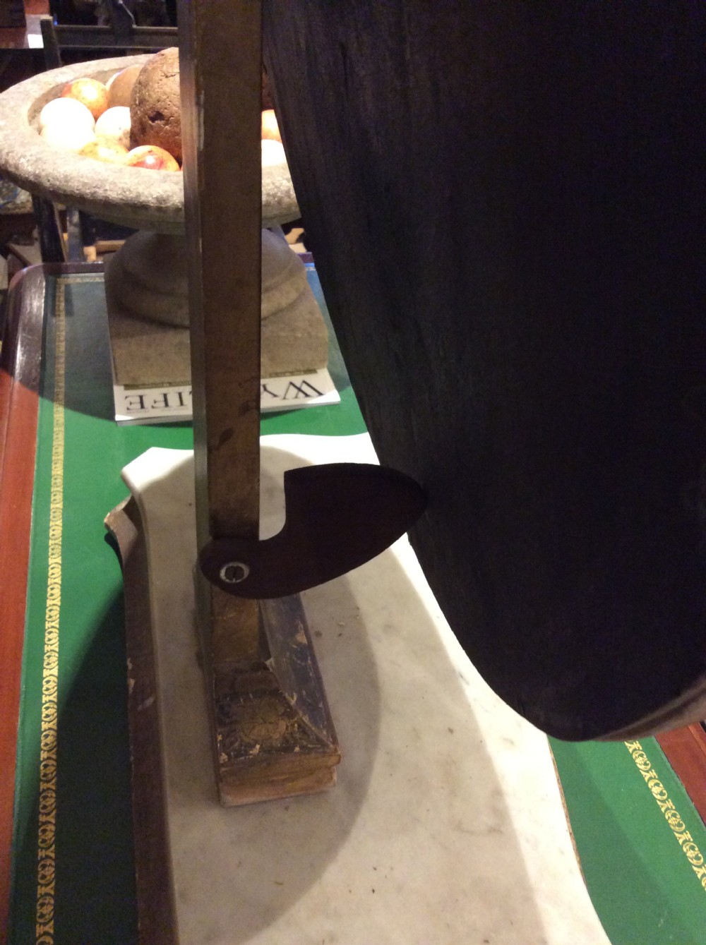 Decorated tilting table mirror on marble plinth View VIII