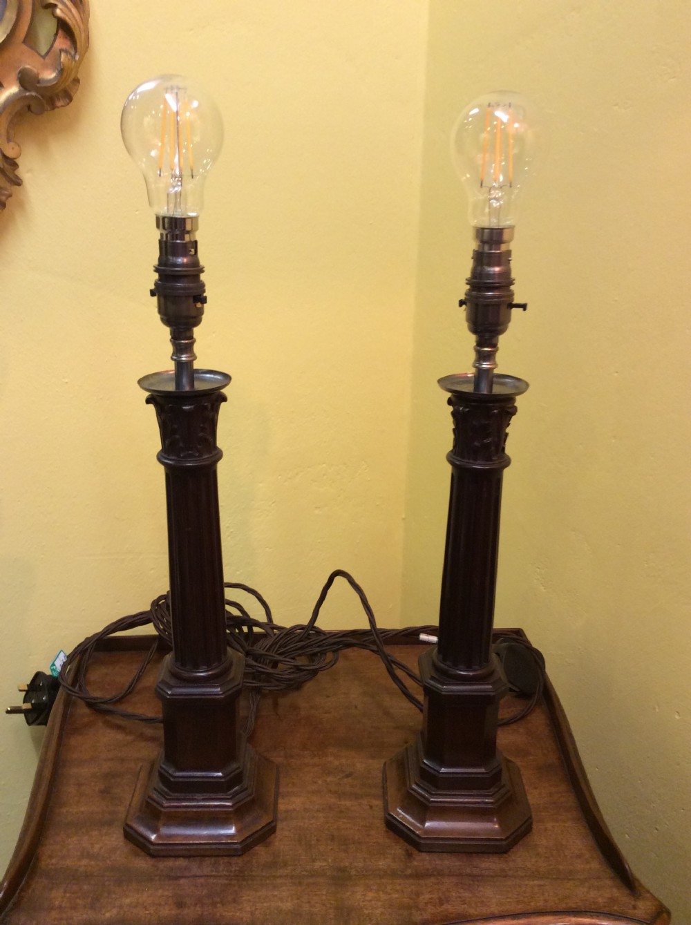A pair of 19thC Mahogany column lamps View IV