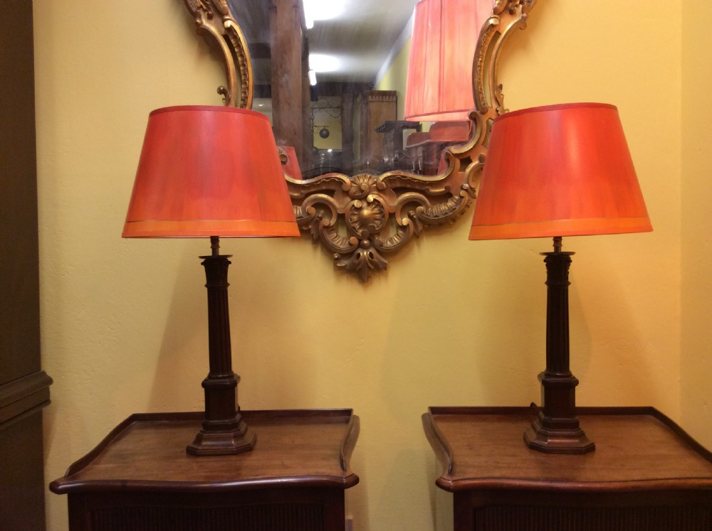 A pair of 19thC Mahogany column lamps