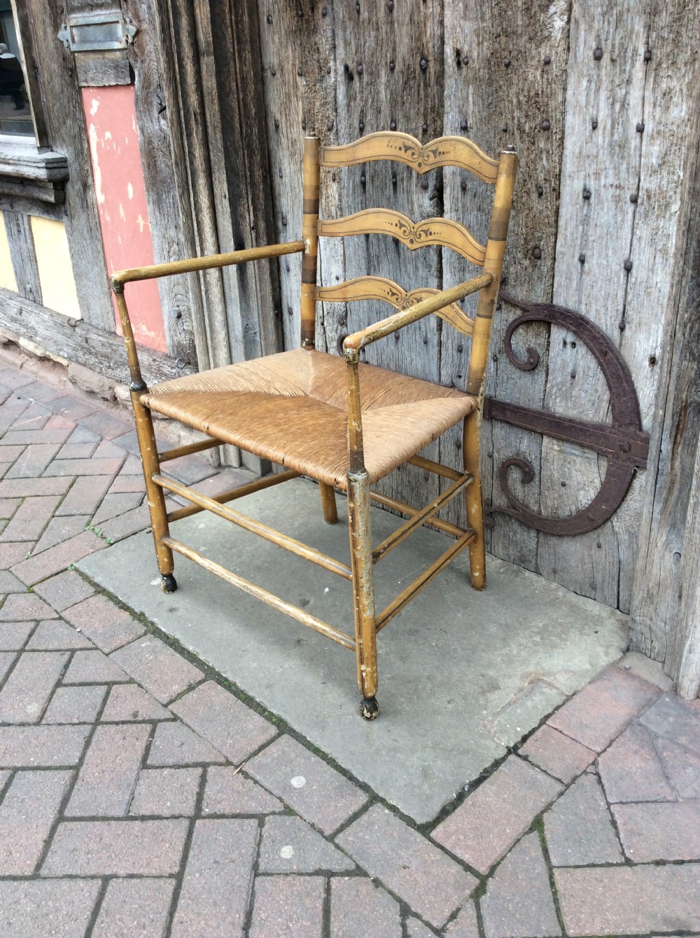 19thC Decorated rushed seat open arm armchair View II