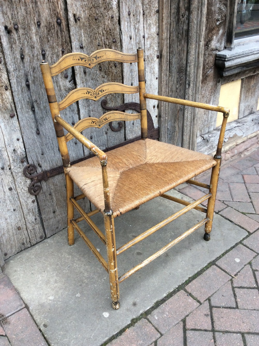 19thC Decorated rushed seat open arm armchair View III